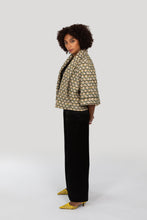 Load image into Gallery viewer, Estelle Cape Jacket - Tweed Green Yellow Ecru Background
